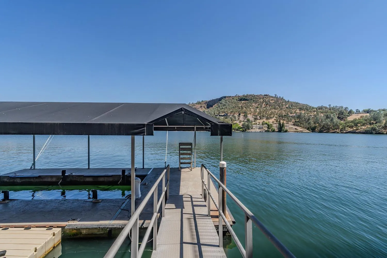 A Boat Dock, Lift, and Two Jet Ski Ports on Lake Tulloch