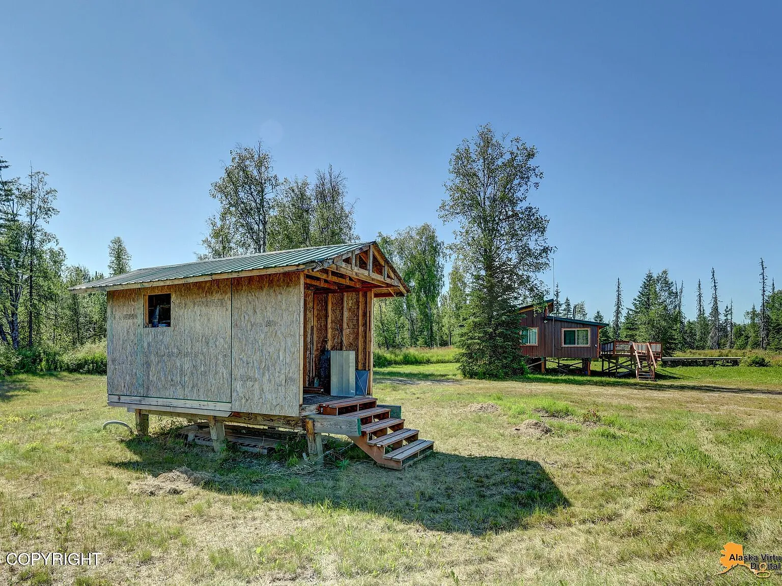 A Fully Furnished Cabin on 400 Feet of Alaska River Frontage