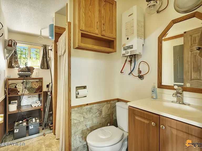 A Fully Furnished Cabin on 400 Feet of Alaska River Frontage