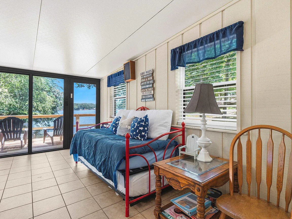 A Private Boat Ramp and a Wall of Windows on the Water in Royal