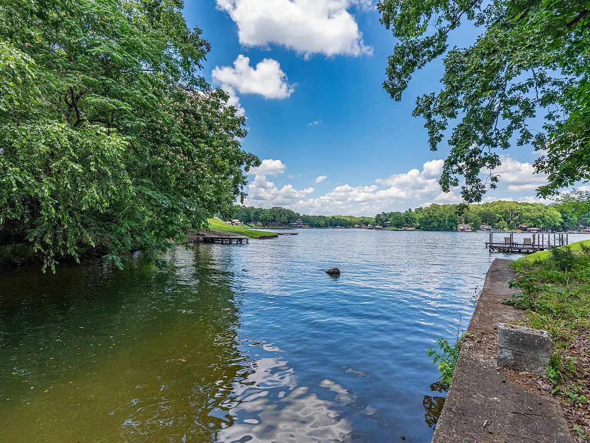 A Private Boat Ramp and a Wall of Windows on the Water in Royal