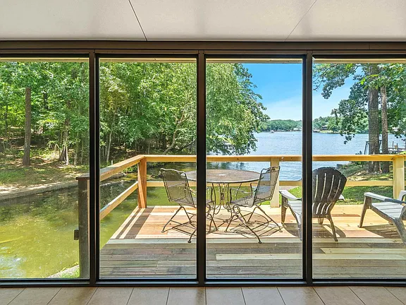 A Private Boat Ramp and a Wall of Windows on the Water in Royal