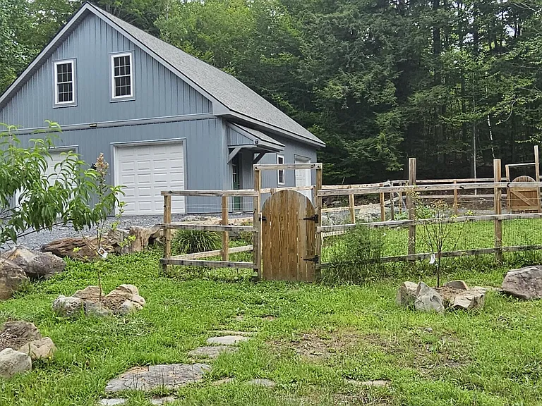 Over 300 Feet of Sandy Pond Frontage on 9.57 Private Acres
