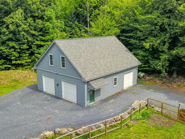 Over 300 Feet of Sandy Pond Frontage on 9.57 Private Acres