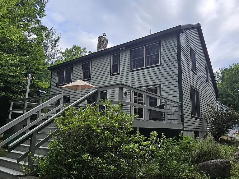 Over 300 Feet of Sandy Pond Frontage on 9.57 Private Acres