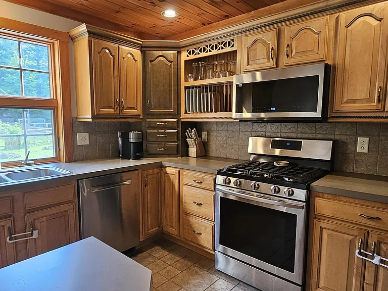 Over 300 Feet of Sandy Pond Frontage on 9.57 Private Acres