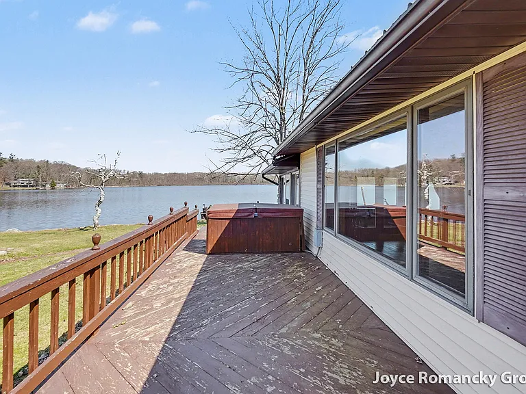 500 Feet of Private Shoreline on Halls Lake in Remus