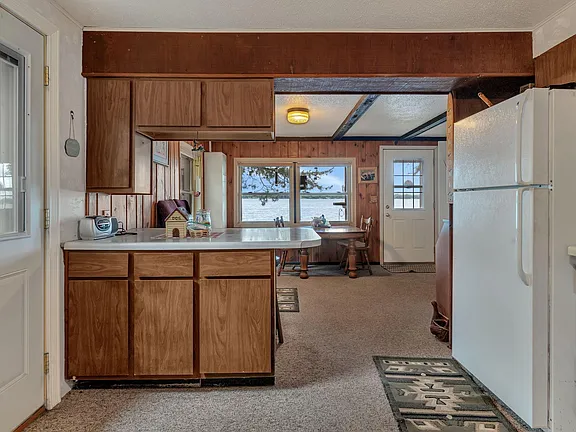 A Fixer-Upper on Norway Lake With 64 Feet of Swimmable Shoreline