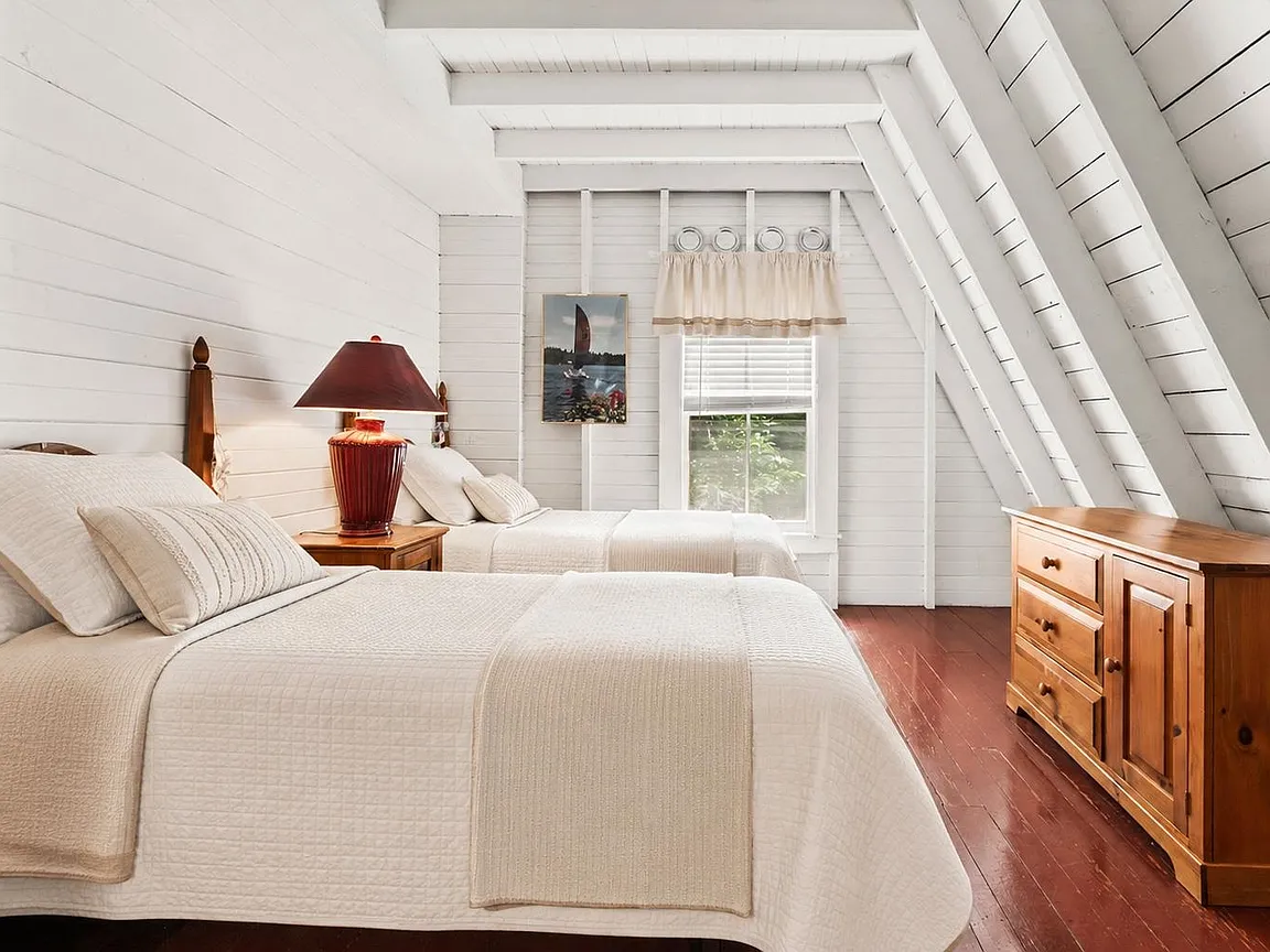 A Deep-Water Boathouse With Its Own Guest Suite on Lake Sunapee