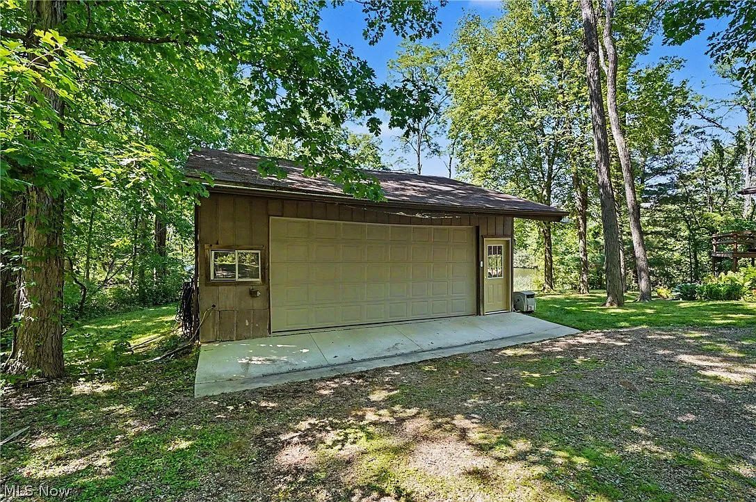 A Blank Canvas on a Private Lake in Bath Township