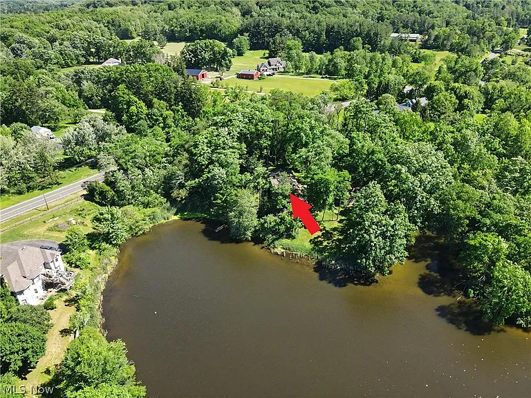 A Blank Canvas on a Private Lake in Bath Township