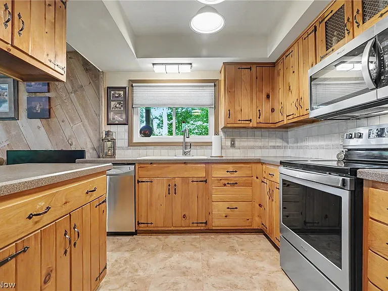 A Blank Canvas on a Private Lake in Bath Township