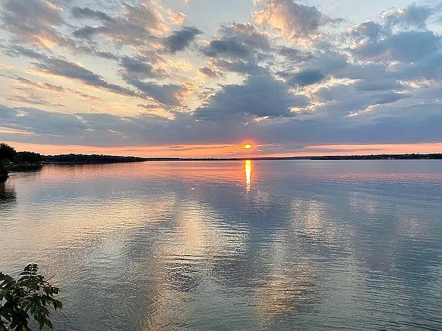 A Deep-Water Dock and Sunset Views on Grand Lake for $650,000