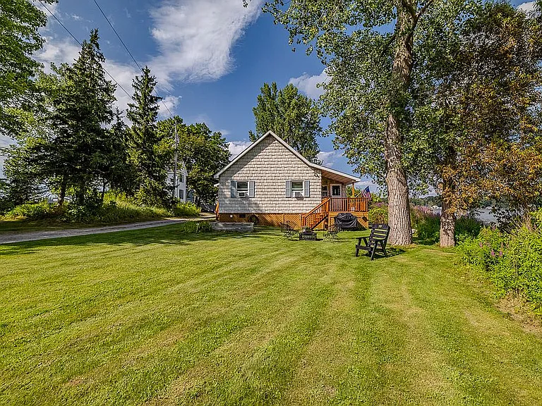 A Double-Lot Cottage Between South Sandy Pond and Lake Ontario