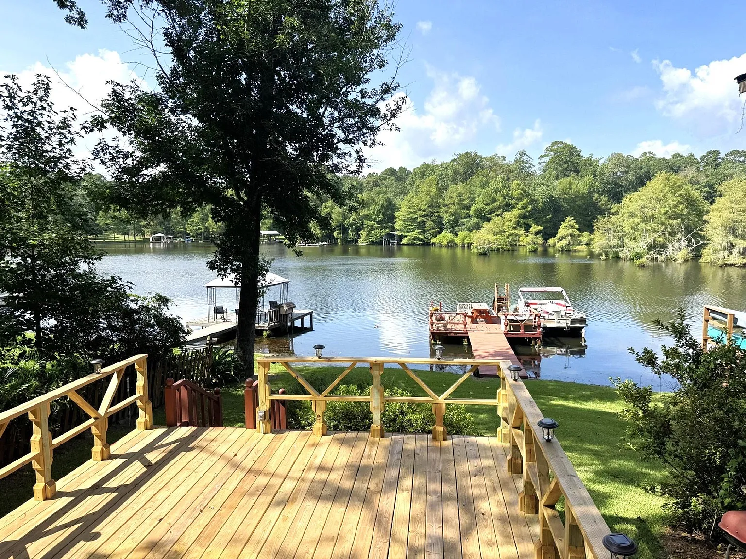 A Private Dock and Two Shaded Lots on Lake Amanda