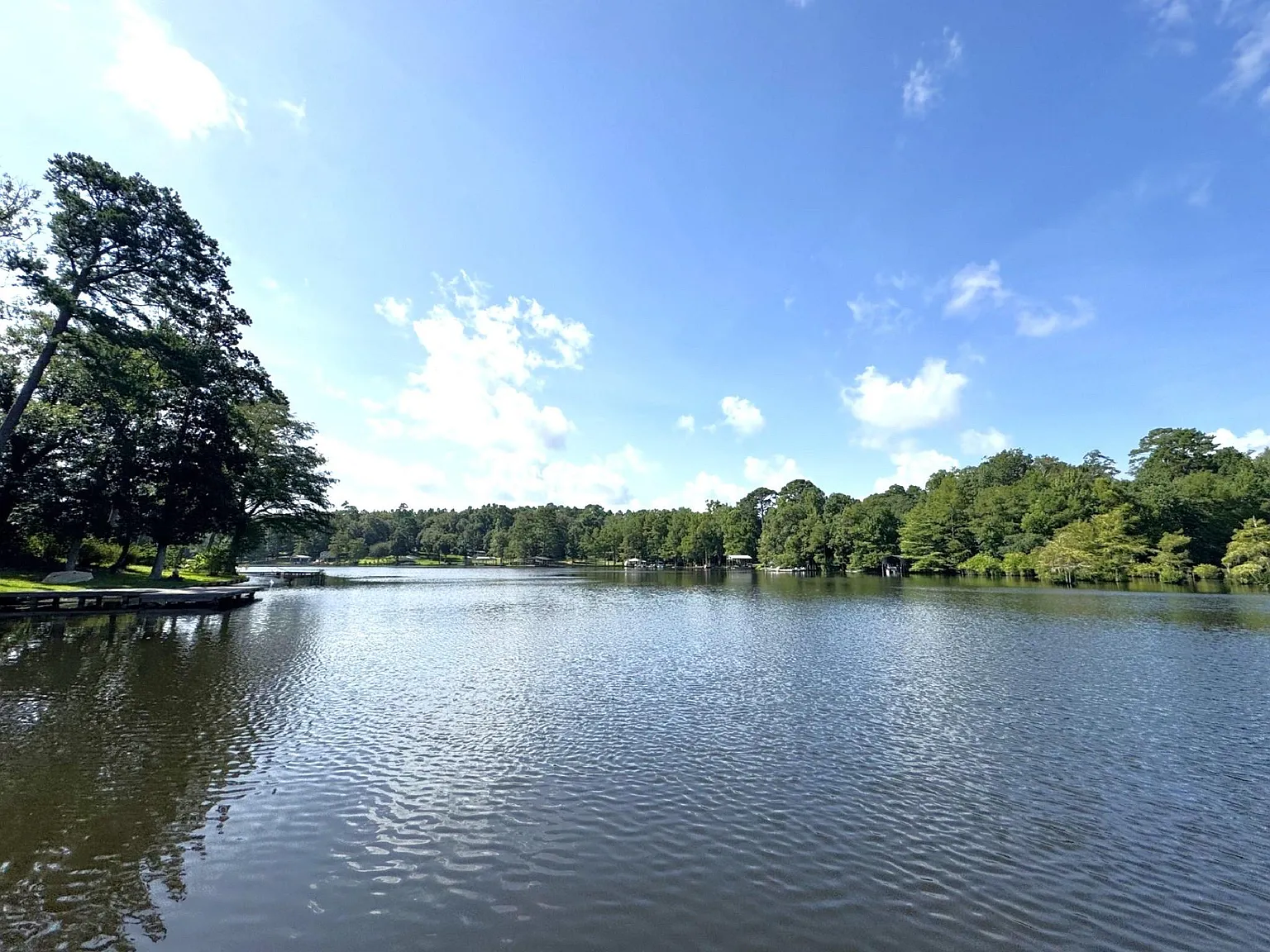 A Private Dock and Two Shaded Lots on Lake Amanda