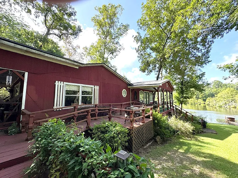 A Private Dock and Two Shaded Lots on Lake Amanda