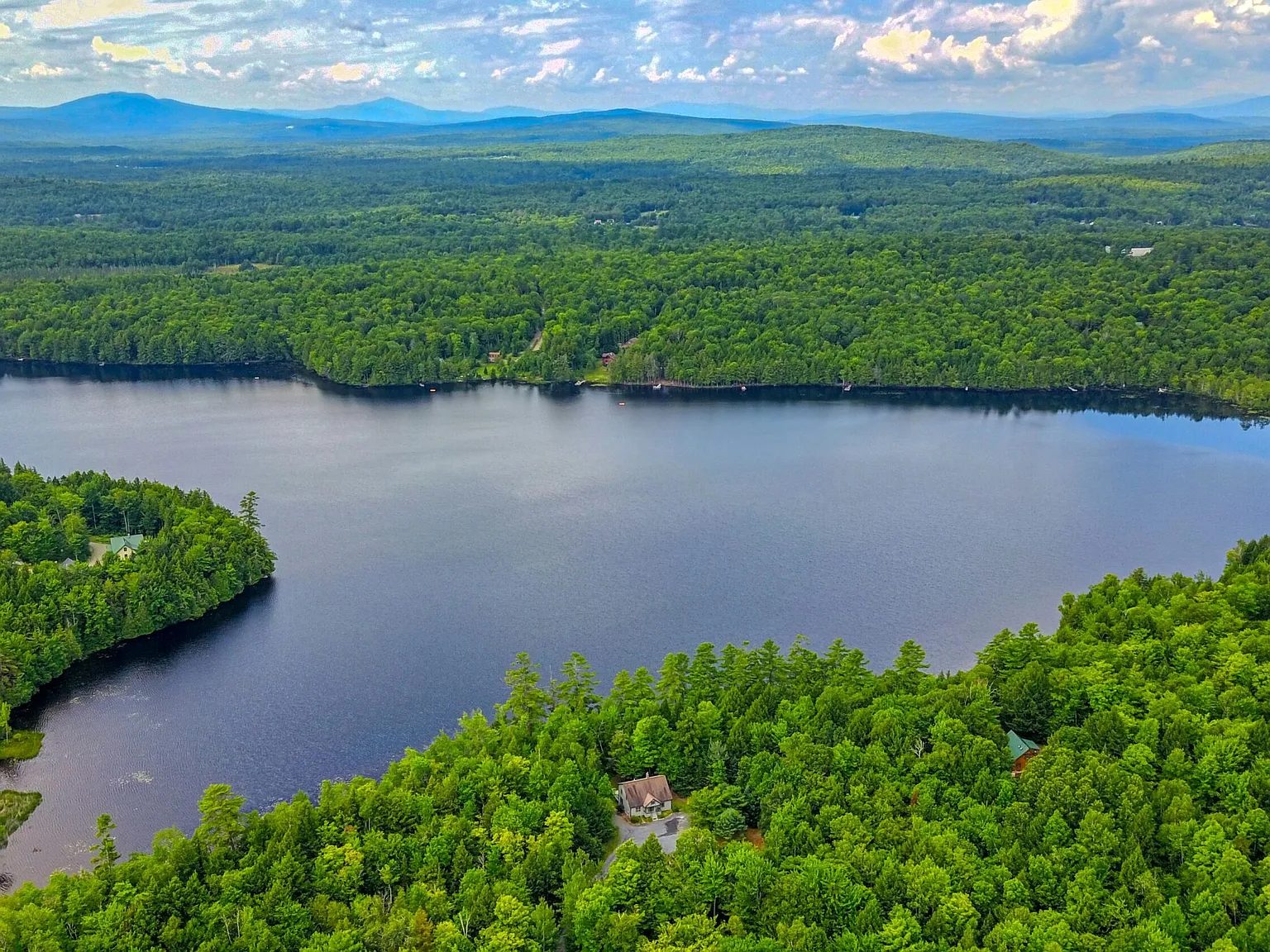 Over 300 Feet of Sandy Pond Frontage on 9.57 Private Acres
