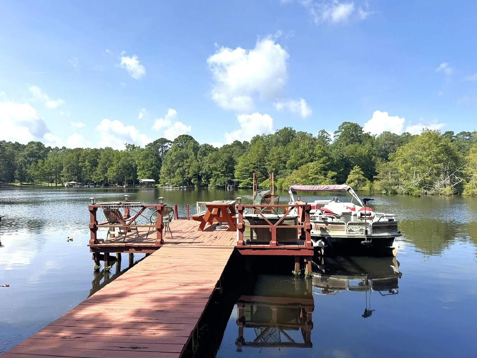 A Private Dock and Two Shaded Lots on Lake Amanda